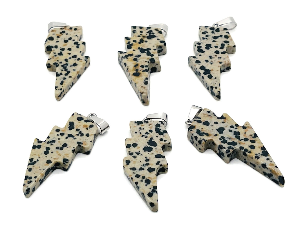 Dalmatian Jasper Lightning Crystal Pendant featuring a lightning-shaped stone by GemstoneGO, showcasing intricate natural patterns.