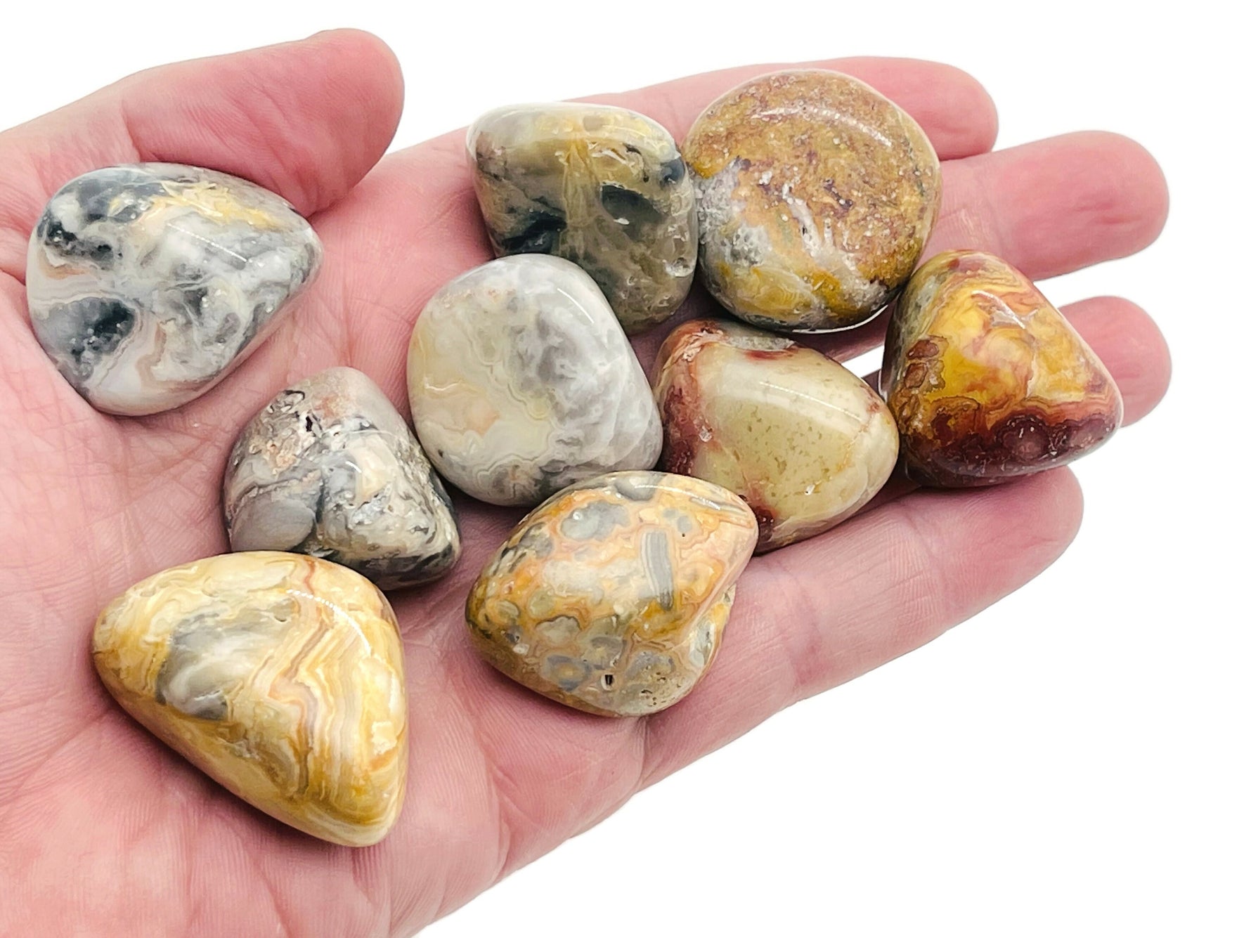 Crazy Lace Agate tumbled stone from GemstoneGO featuring vibrant, intricate patterns in a polished Mexican agate specimen.