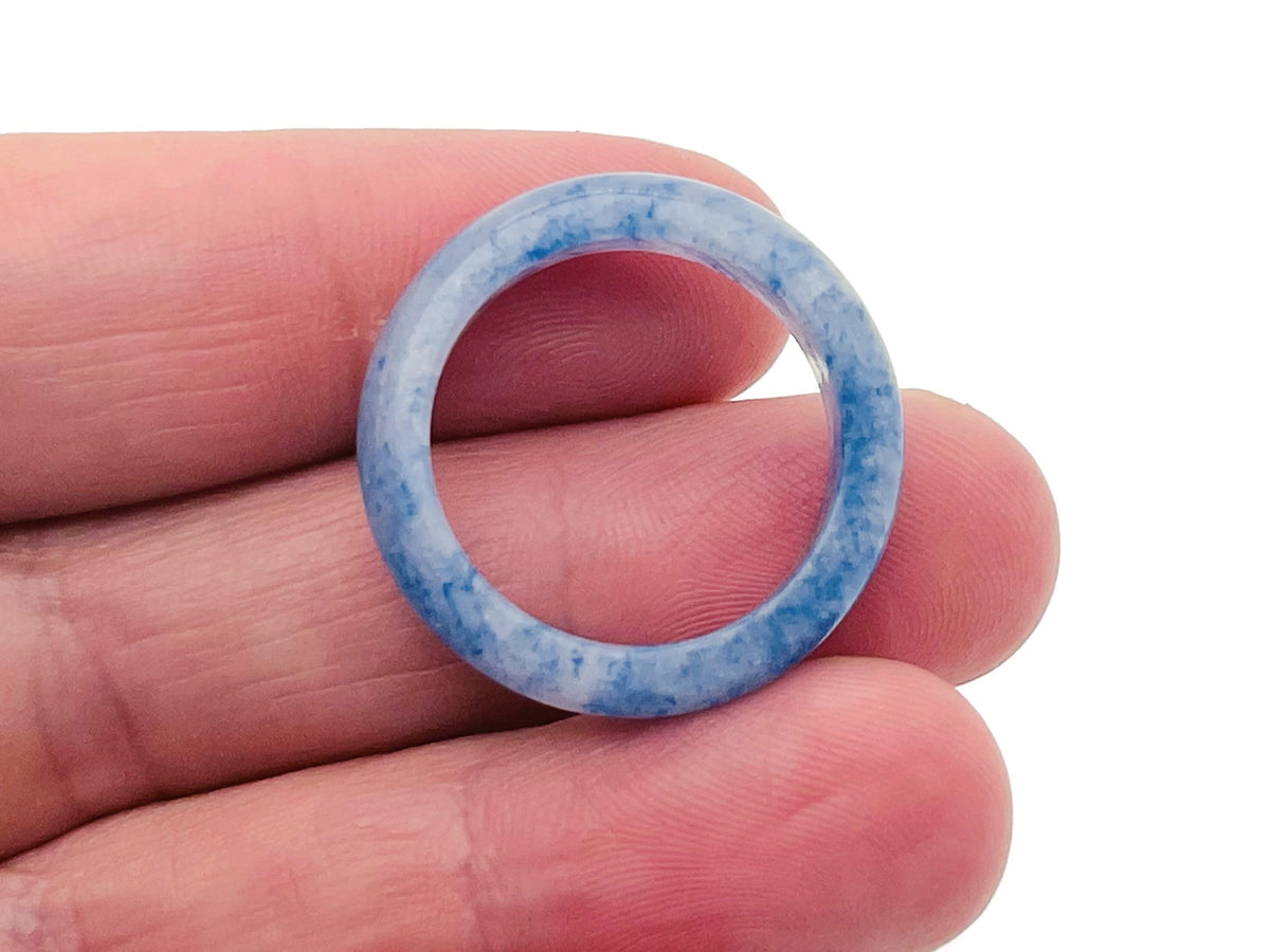 Blue aventurine crystal ring by GemstoneGO featuring a smooth, polished blue stone set in a silver band jewelry piece