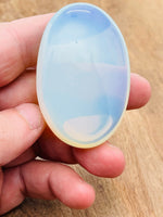 Opalite palm gemstone spa stone, 60x40mm, smooth polished healing crystal from GemstoneGO, ideal for relaxation and meditation.