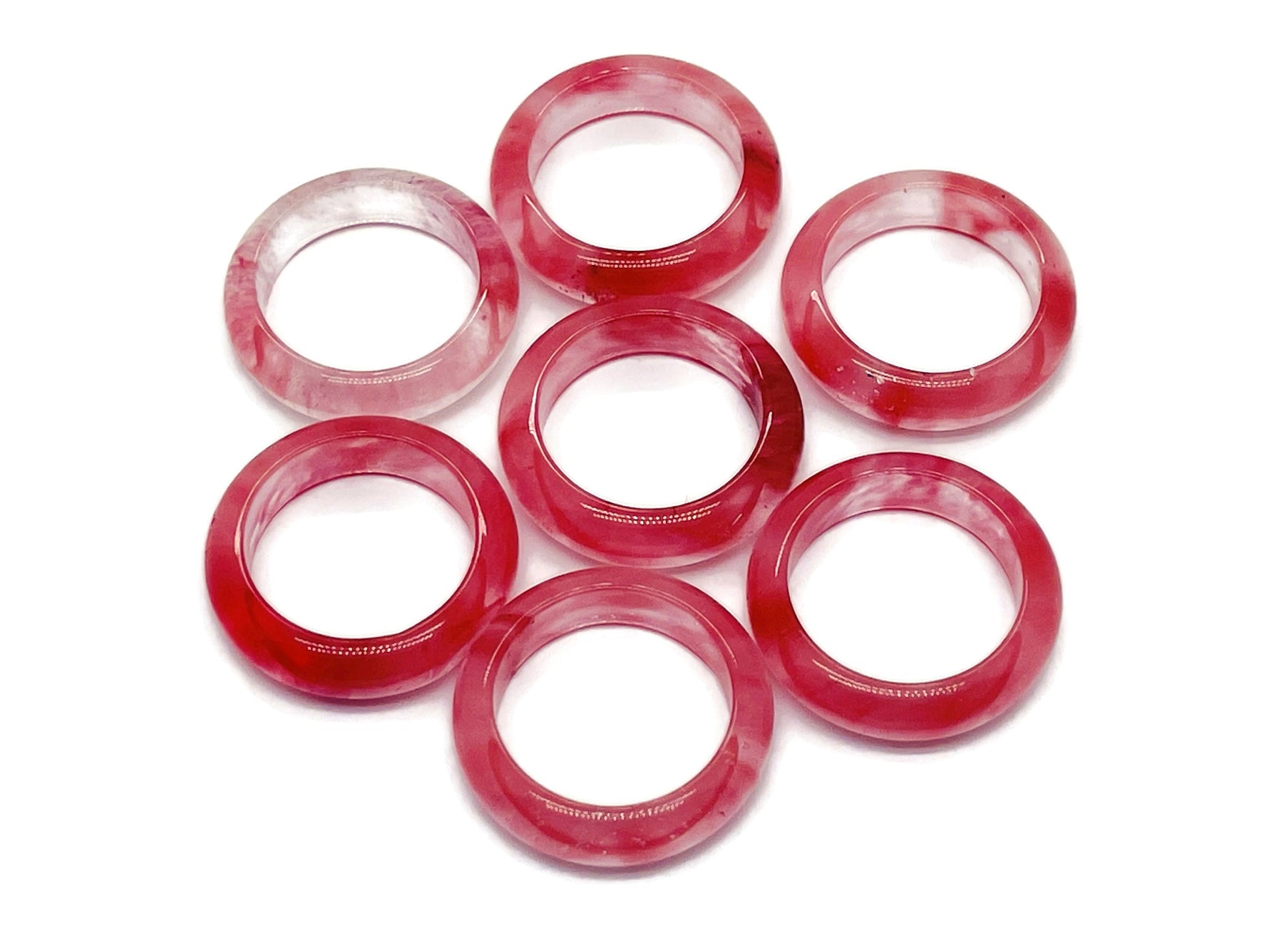 Cherry Quartz crystal ring by GemstoneGO featuring a vibrant red gemstone set in a silver band.