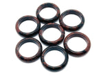 Mahogany Obsidian crystal ring by GemstoneGO featuring a polished gemstone set in a silver band.
