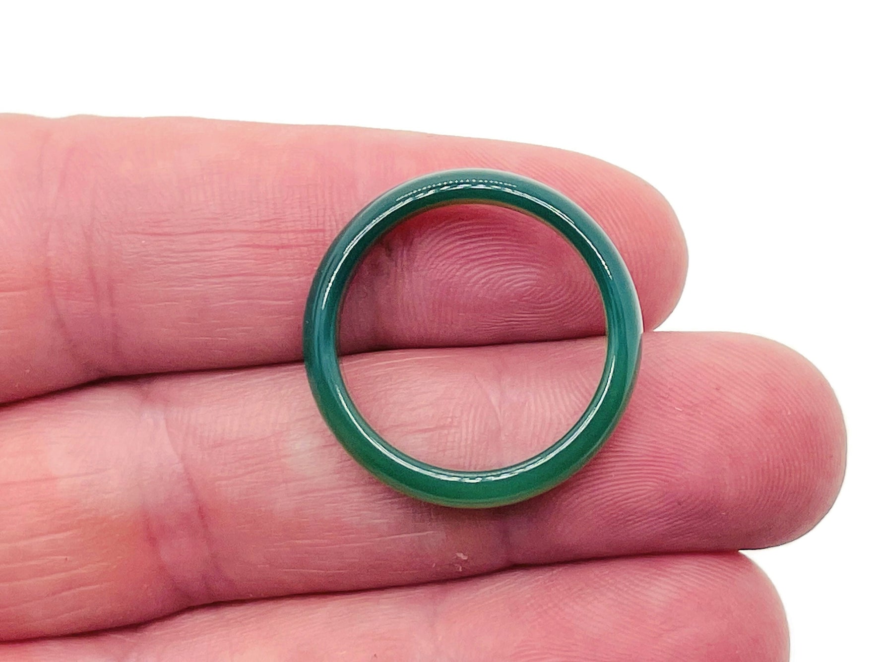 Green Agate crystal ring by GemstoneGO featuring a polished green agate stone set in a silver band.