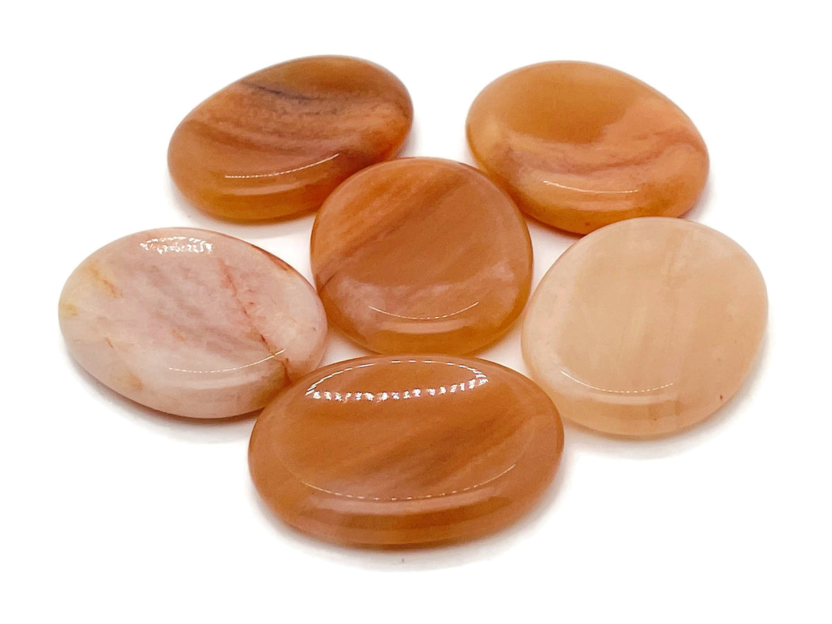 Orange aventurine worry stone from GemstoneGO, 4.5x3.5cm soothing crystal for stress relief and meditation.