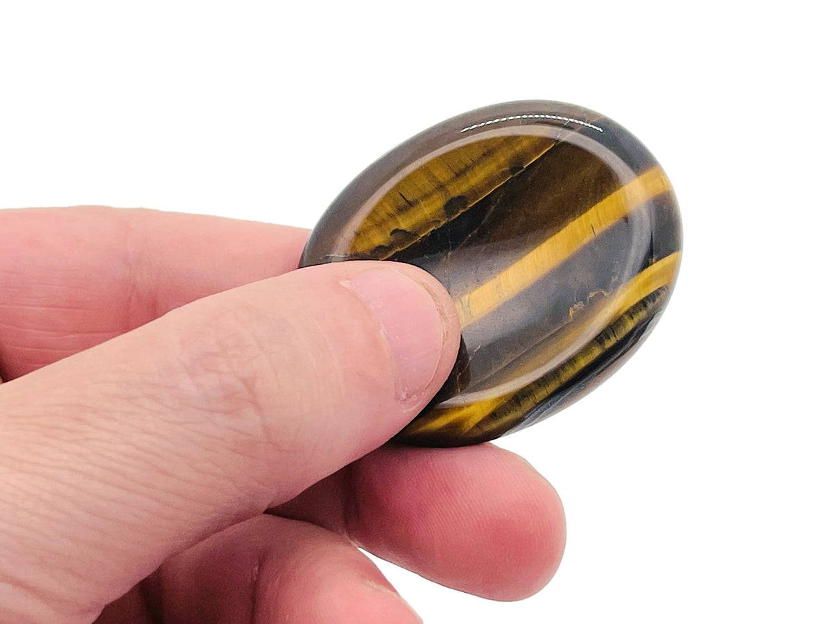 Tiger Eye worry stone from GemstoneGO, 4.5x3.5cm, smooth polished crystal for calming and stress relief.