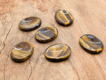 Tiger Eye worry stone from GemstoneGO, 4.5x3.5cm soothing crystal with polished, smooth surface for stress relief.