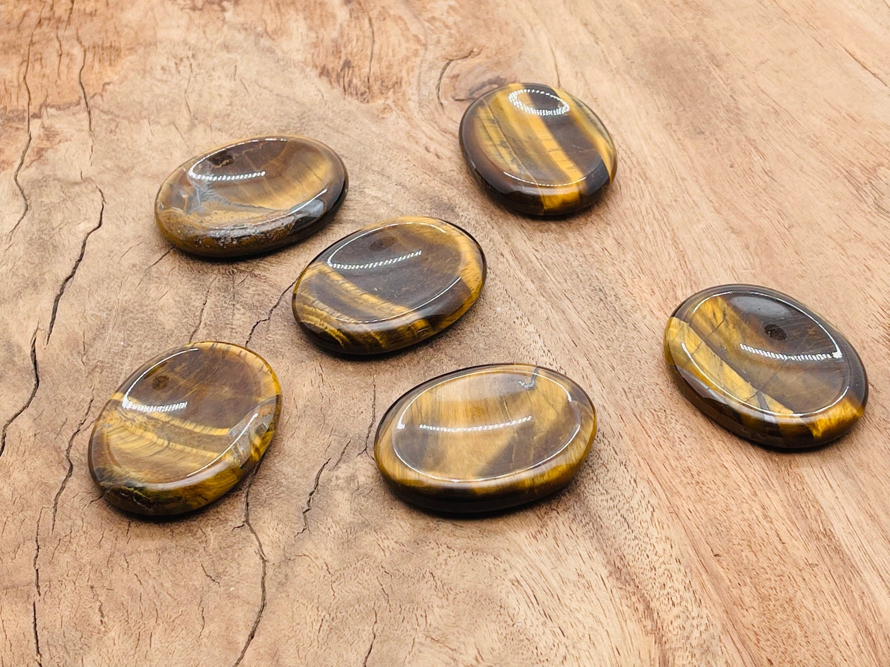 Tiger Eye worry stone from GemstoneGO, 4.5x3.5cm soothing crystal with polished, smooth surface for stress relief.