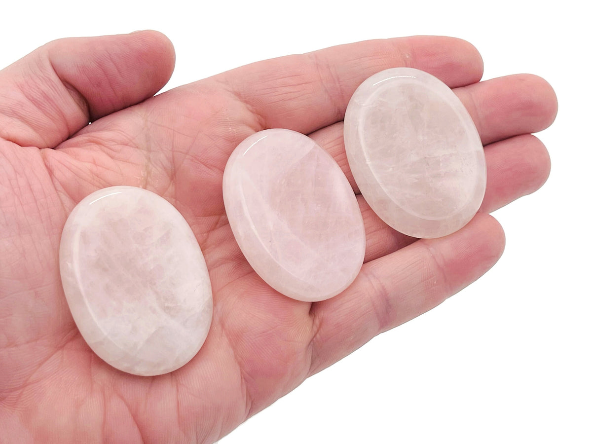 Rose quartz worry stone from GemstoneGO, soothing crystal, 4.5x3.5cm, with smooth polished surface and calming pink hue.