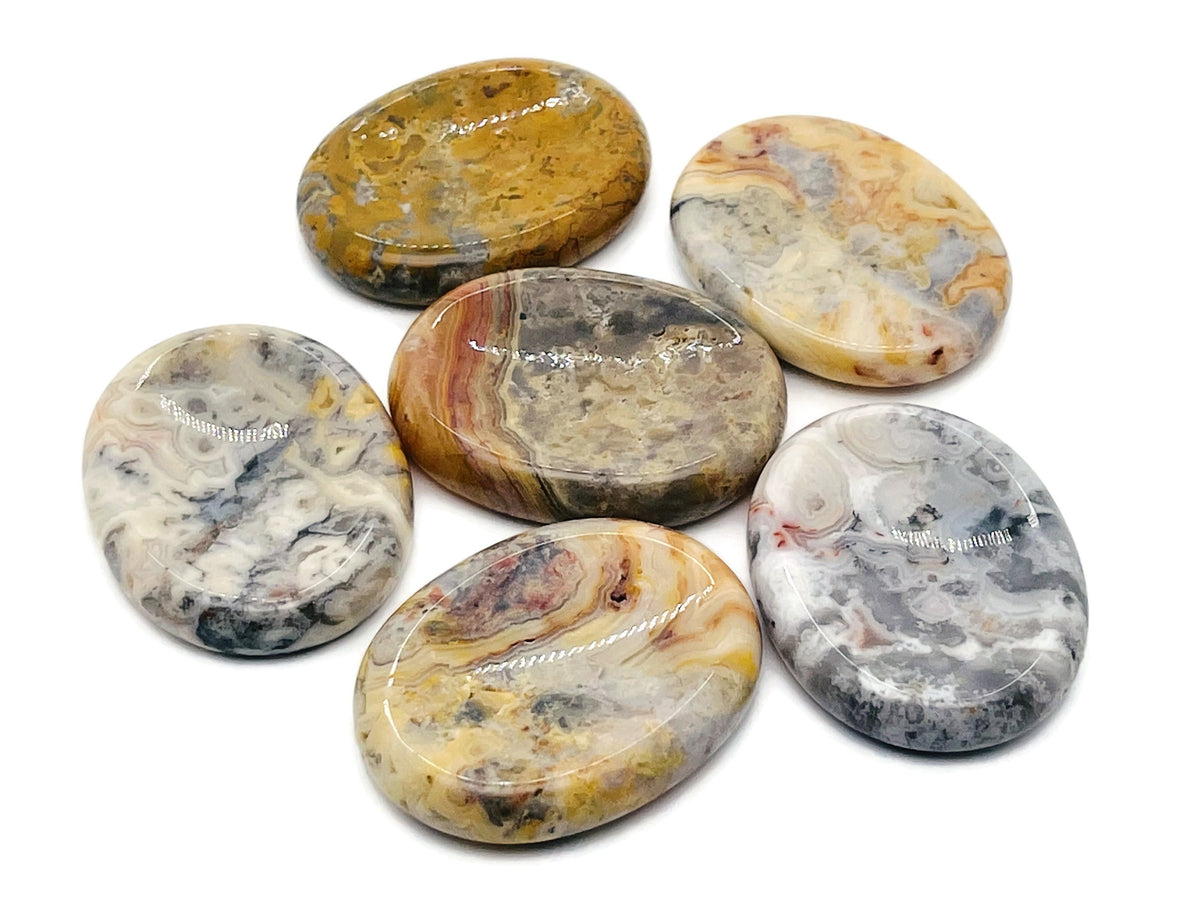 Crazy Lace Agate worry stone from GemstoneGO, 4.5x3.5cm, featuring vibrant, intricate lace-like patterns in polished crystal.