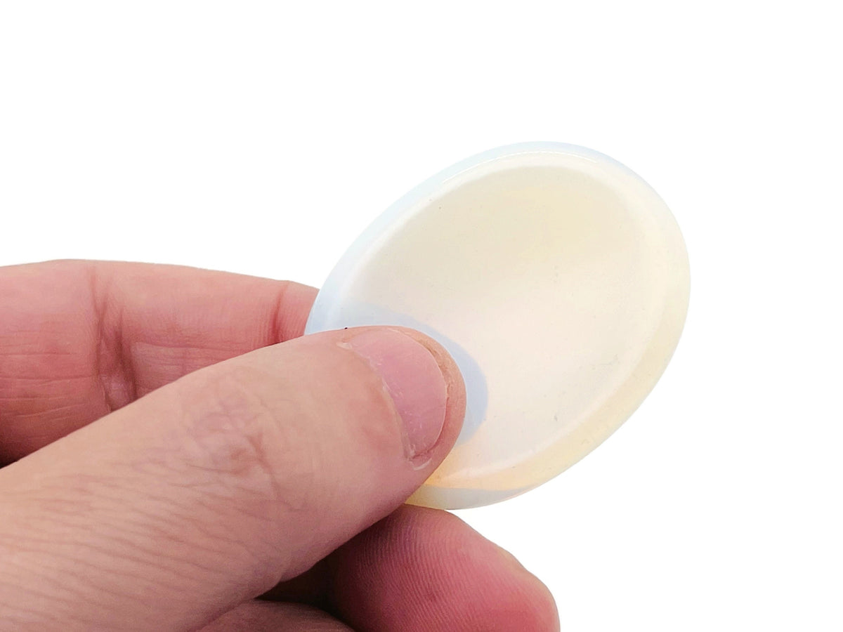 Opalite worry stone, gemstone thumb and pocket crystal, smooth 4.5x3.5cm gemstone from GemstoneGO, used for calming and stress relief.
