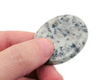 Kiwi Jasper worry stone from GemstoneGO, soothing crystal with green and brown patterns, measuring 4.5x3.5cm.