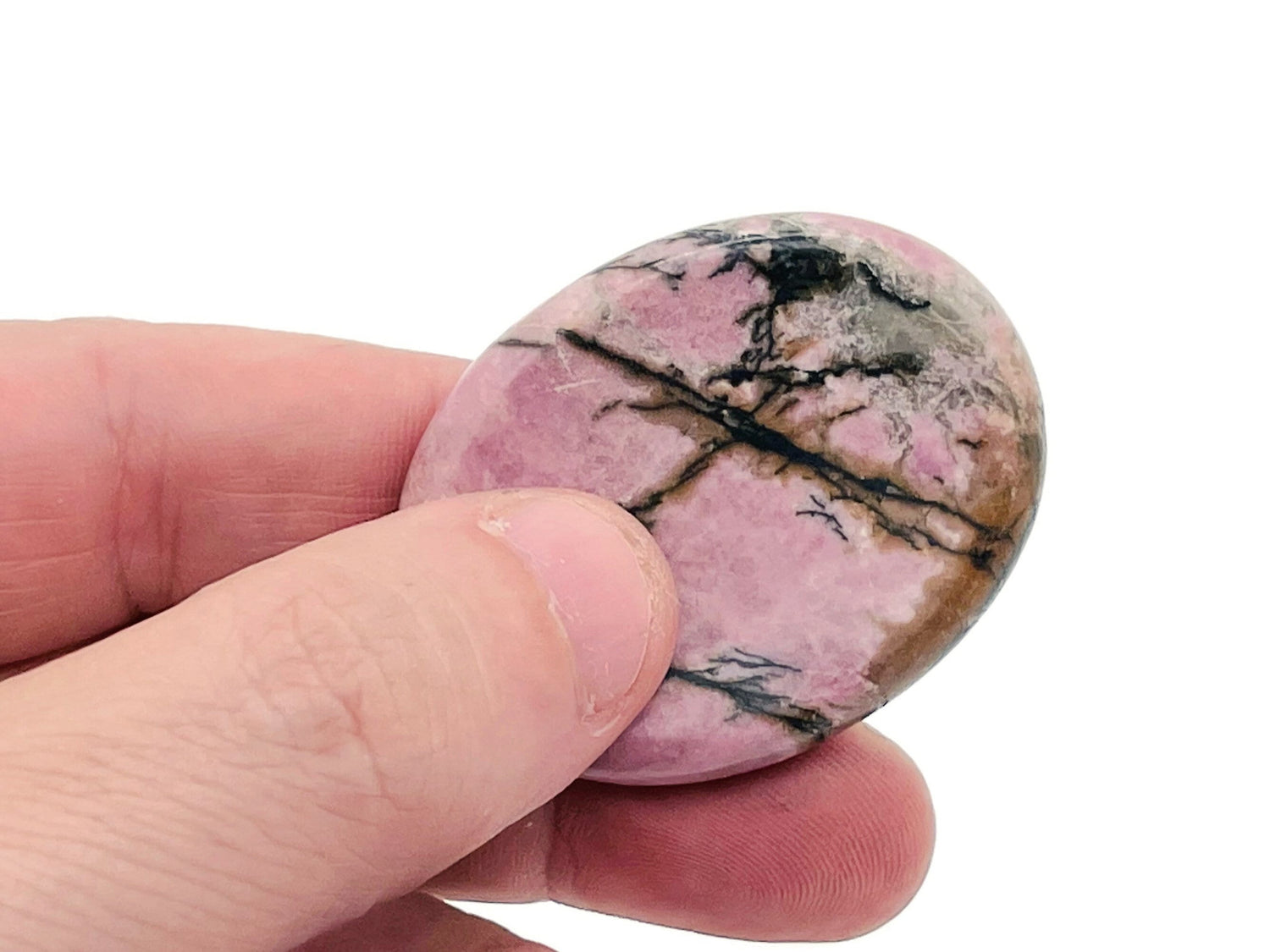 Rhodonite worry stone from GemstoneGO, smooth pink and black crystal 4.5x3.5cm for stress relief and meditation.