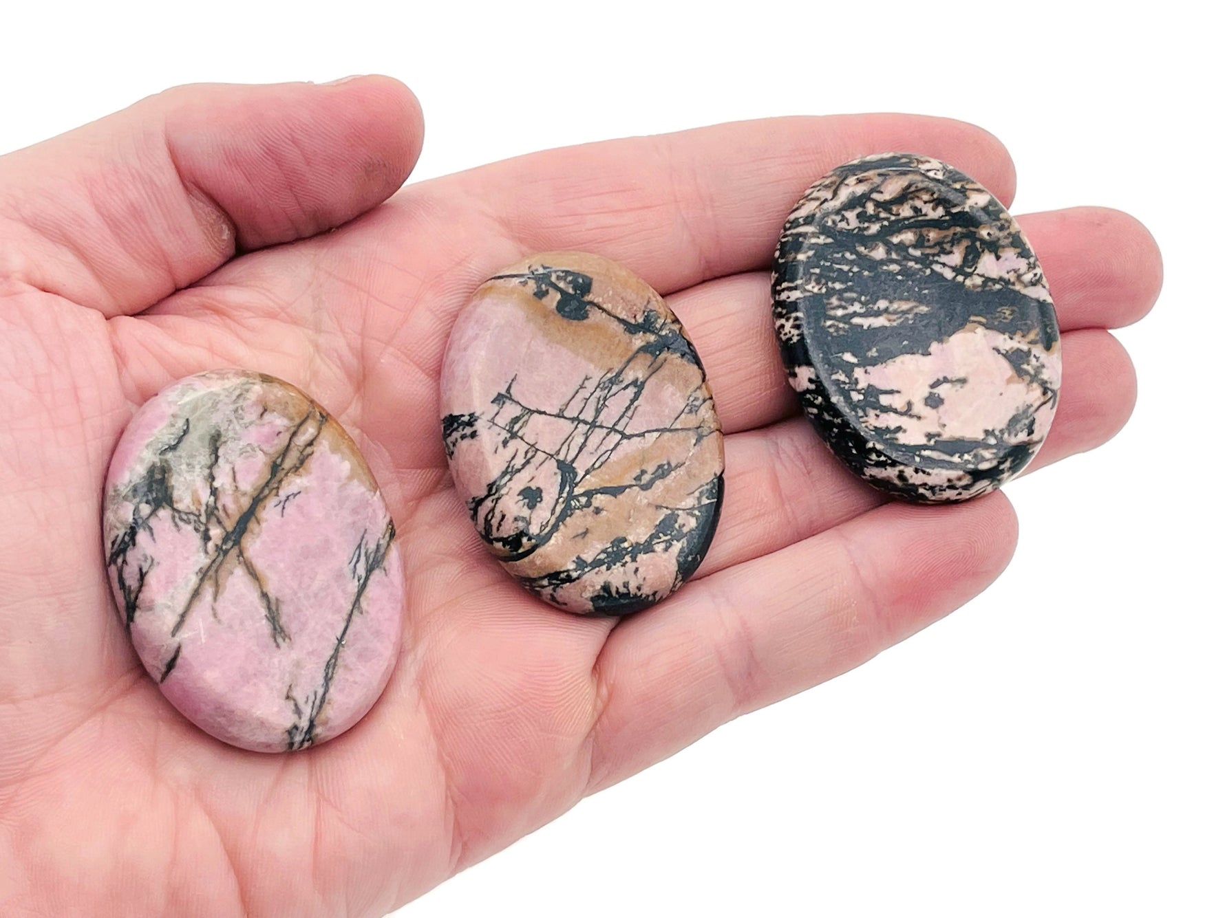 Rhodonite worry stone from GemstoneGO, 4.5x3.5cm soothing crystal for stress relief and meditation.