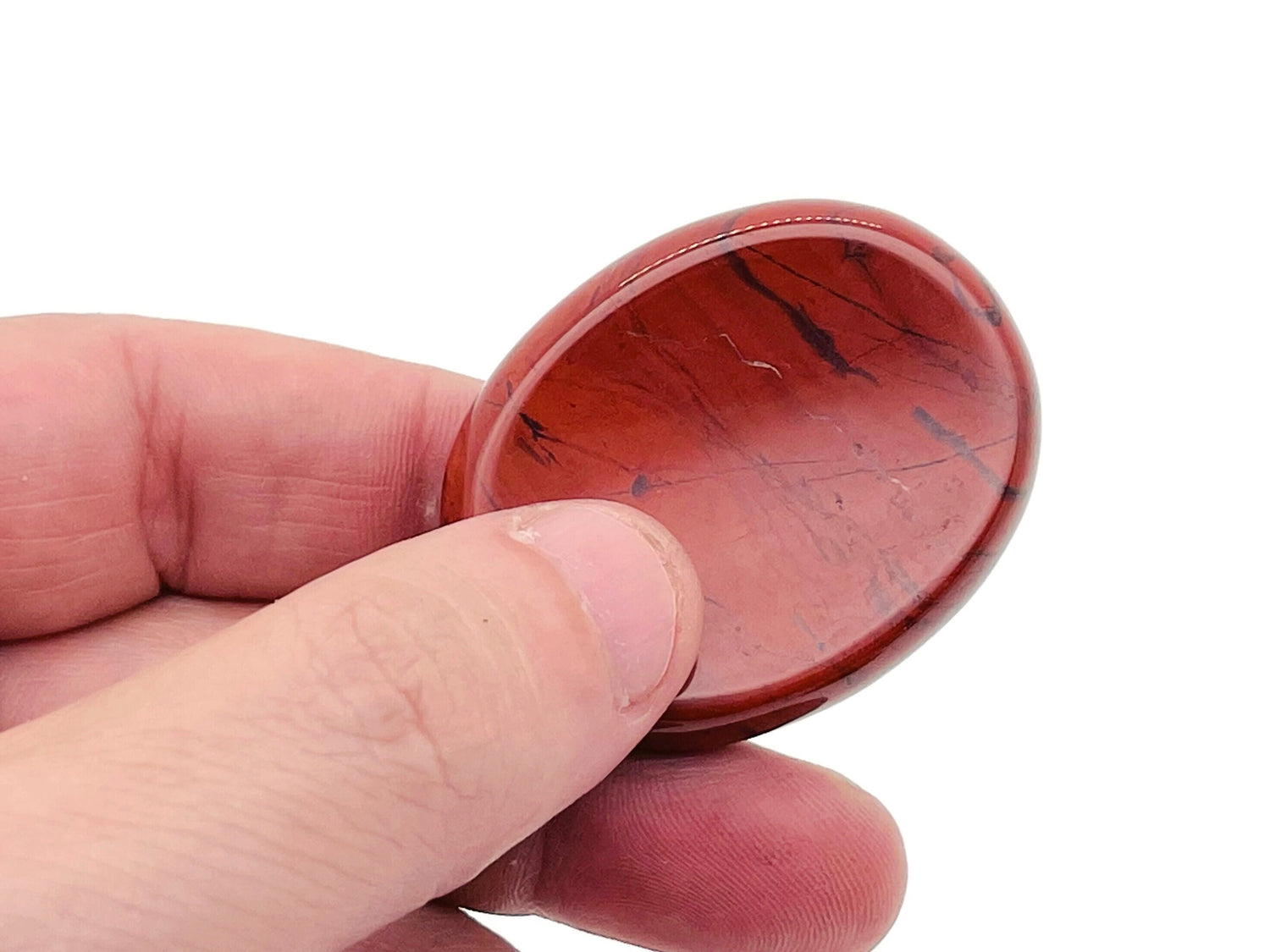 Red Jasper worry stone from GemstoneGO, 4.5x3.5cm smooth crystal for calming and stress relief.