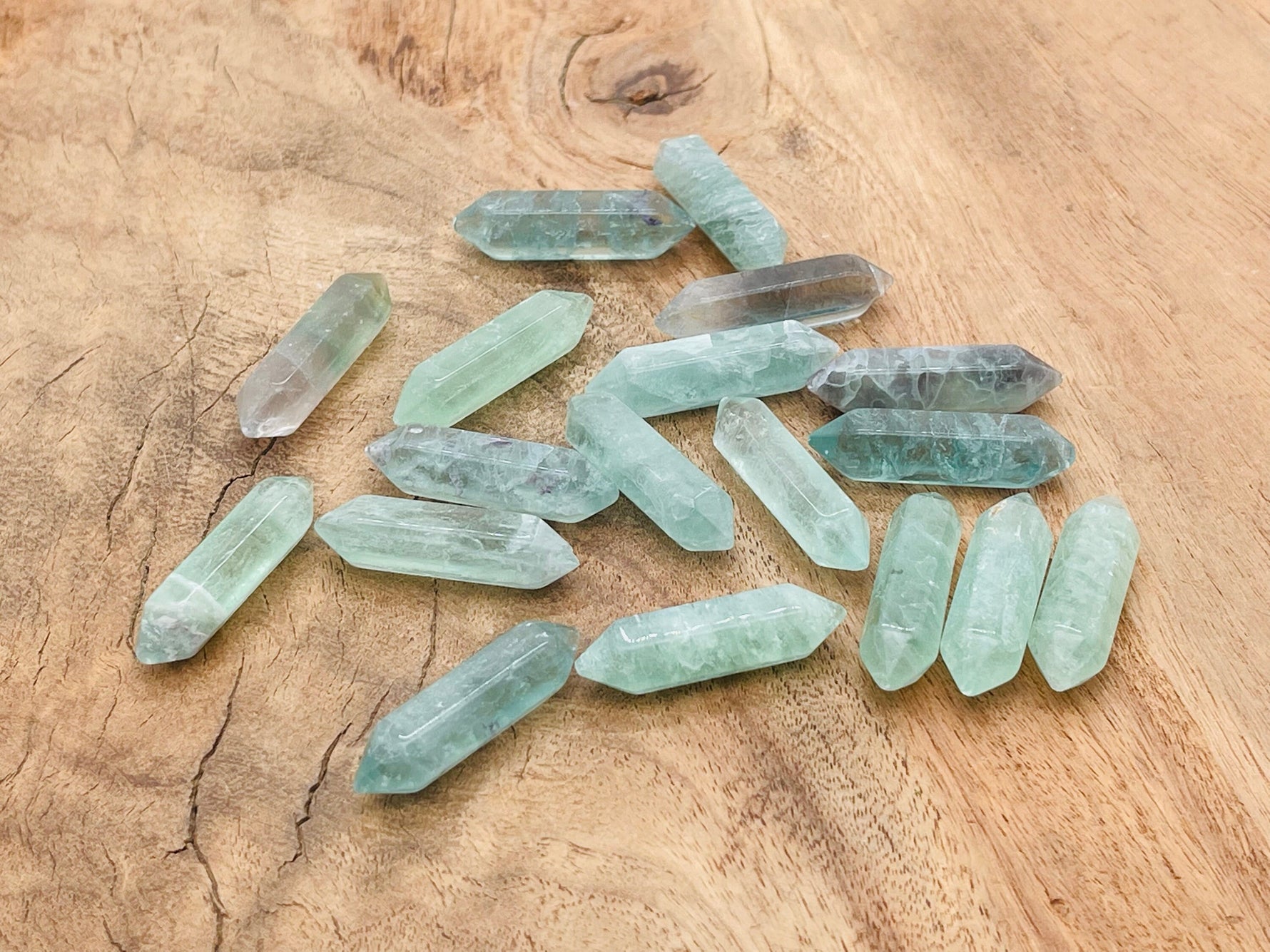 Green fluorite terminated carved point gemstone, 33mm, showcasing vibrant color and natural crystal formation by GemstoneGO.