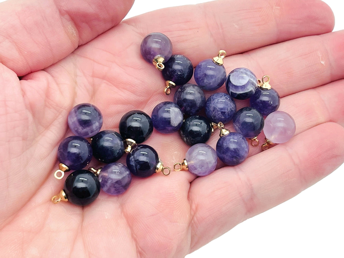 Amethyst ball beads crystal pendant from GemstoneGO featuring polished purple gemstone jewelry stone.