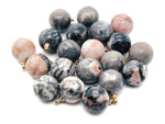 Pink Zebra Calcite ball beads crystal pendant featuring vibrant pink and white hues, handcrafted jewelry stone from GemstoneGO.