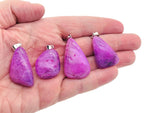 Lilac agate crystal pendant with silver bail, showcasing a polished loose stone ideal for Reiki healing and jewelry making.