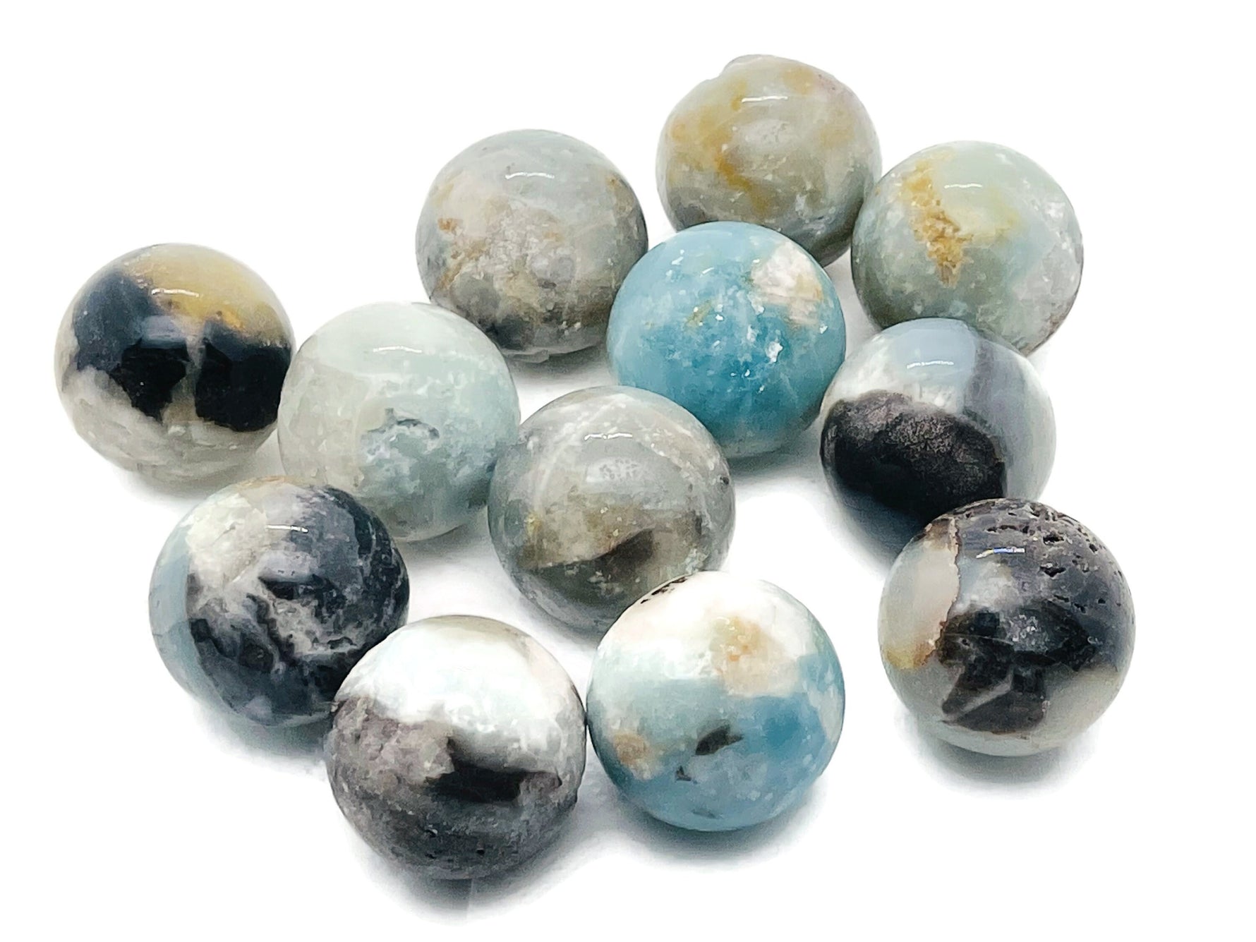 Caribbean Calcite gemstone sphere, 30mm crystal ball from GemstoneGO, polished stone with vibrant orange and yellow hues.