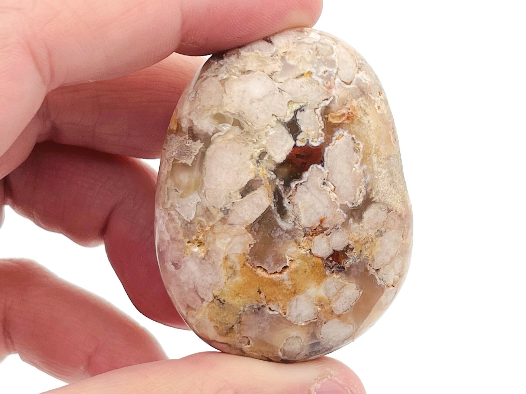 Flower Agate palm gemstone spa stone with cherry blossom design from GemstoneGO, showcasing pink and white floral patterns.