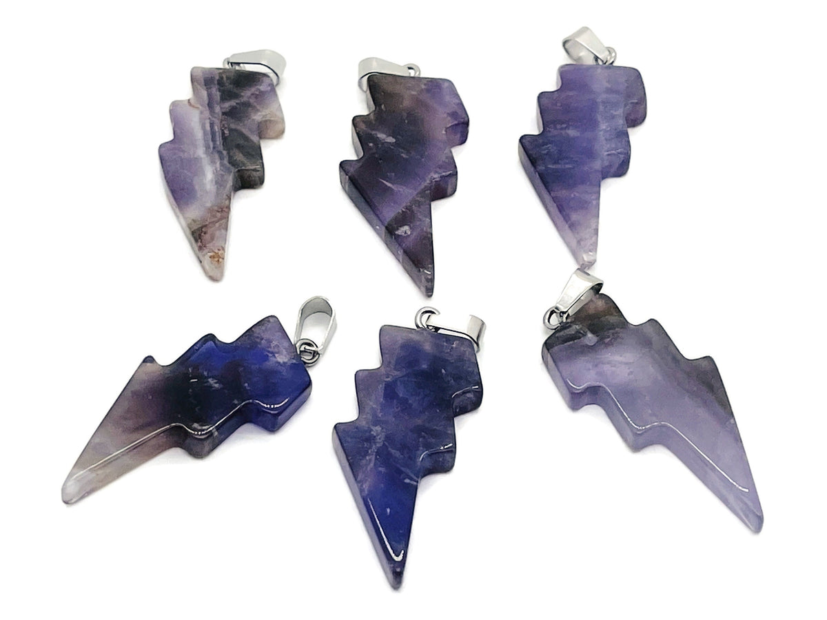 Rose Quartz Lightning Crystal Pendant by GemstoneGO featuring a polished pink quartz crystal with a lightning shape design.