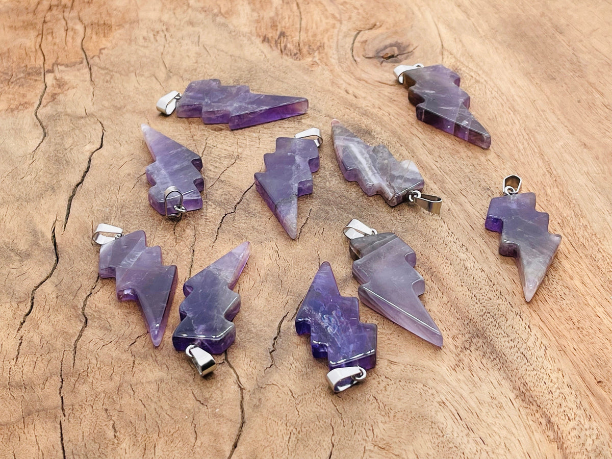 Amethyst lightning crystal pendant from GemstoneGO featuring a striking lightning stone gemstone on a silver chain.