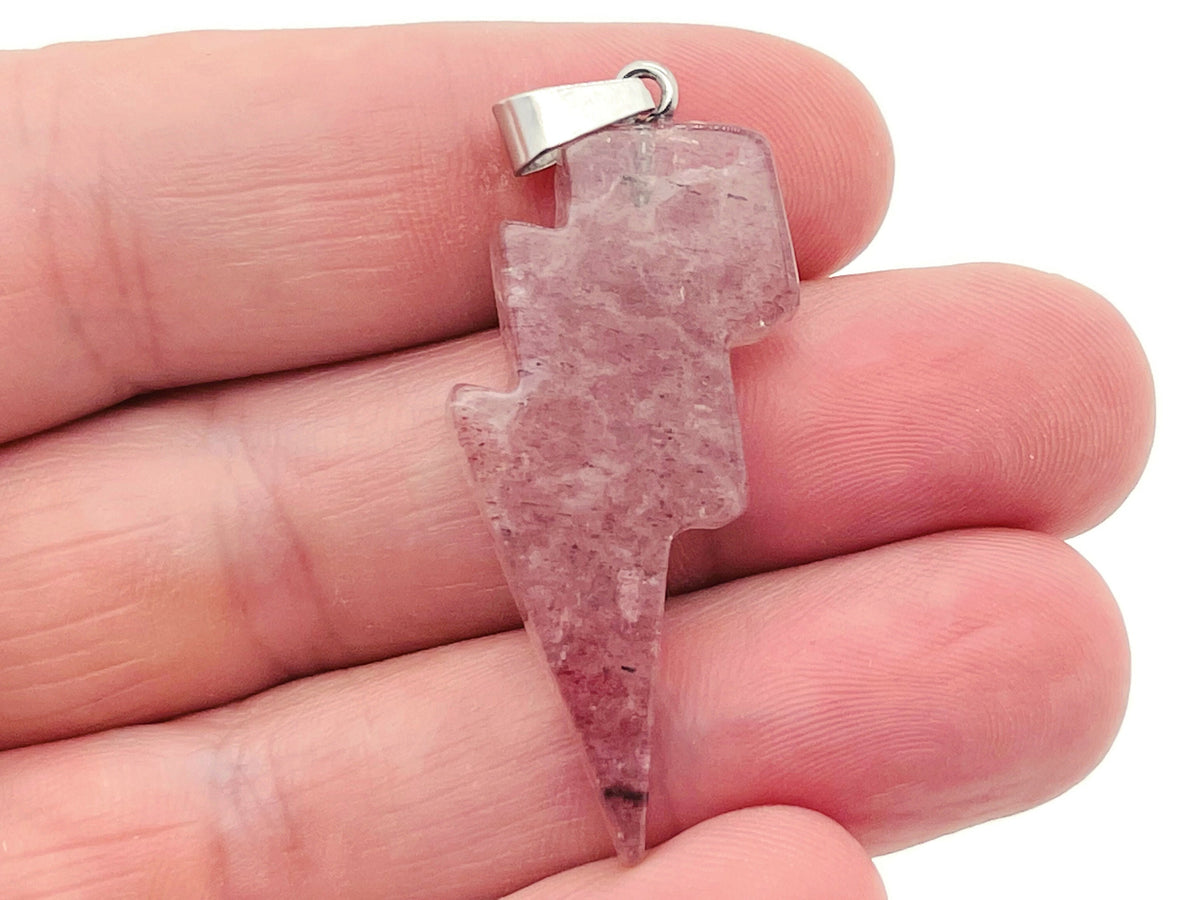 Strawberry Quartz Lightning Crystal Pendant from GemstoneGO featuring a vibrant pink quartz lightning stone necklace.
