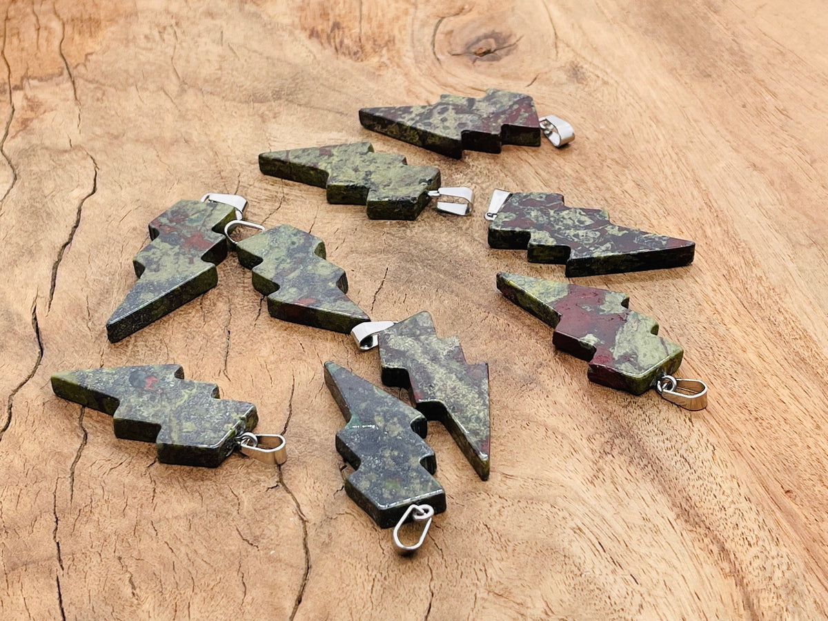 Dragon Blood Jasper lightning crystal pendant featuring a striking lightning stone, showcasing vibrant red and black hues.
