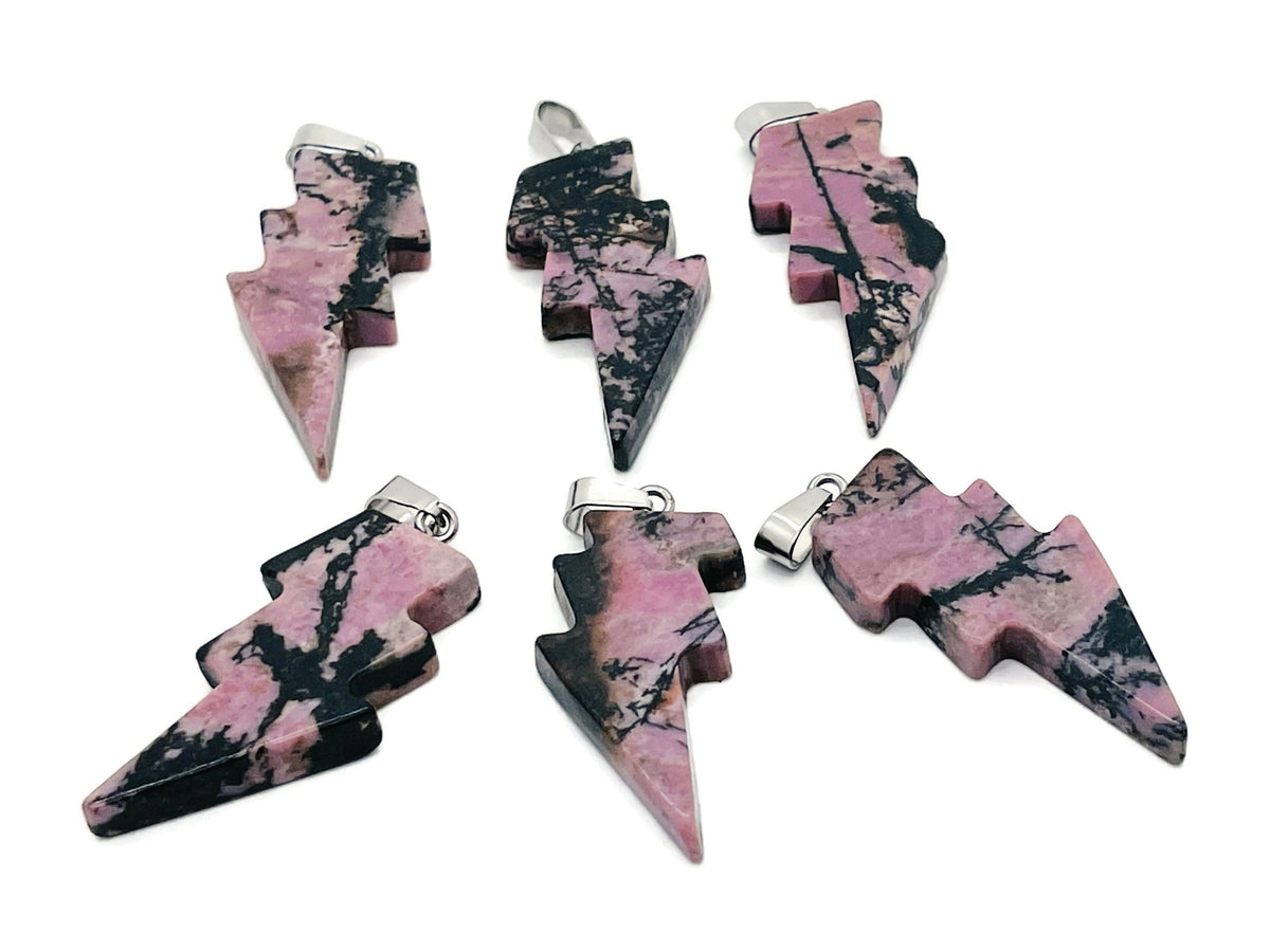 Rhodonite Lightning Crystal Pendant from GemstoneGO featuring a striking lightning stone gemstone pendant with intricate details.
