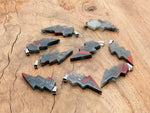 African Bloodstone Lightning Crystal pendant featuring a striking lightning stone gemstone on a silver chain.