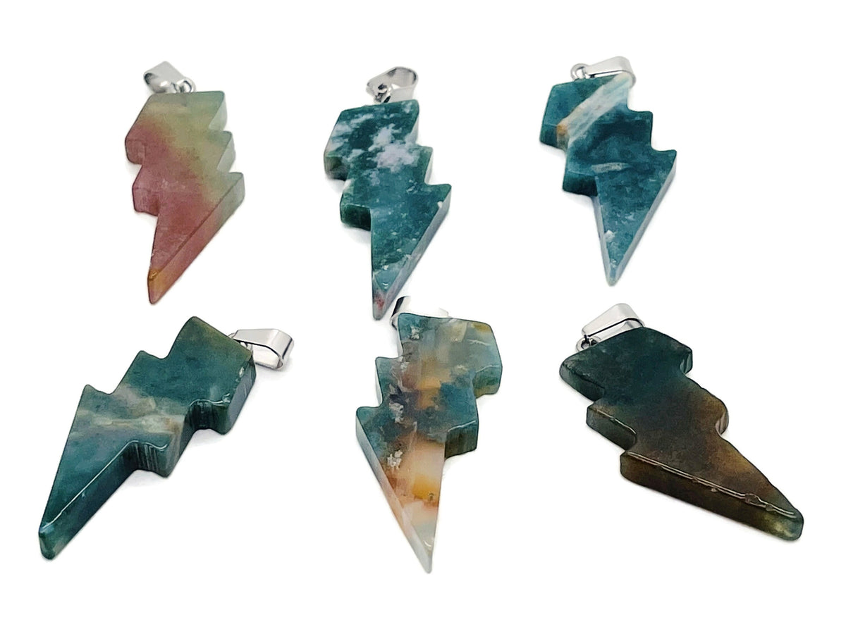 Moss agate lightning crystal pendant from GemstoneGO featuring a natural lightning stone design on a silver chain.