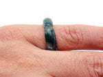 Moss Agate crystal ring by GemstoneGO featuring a polished moss green gemstone set in a silver band.