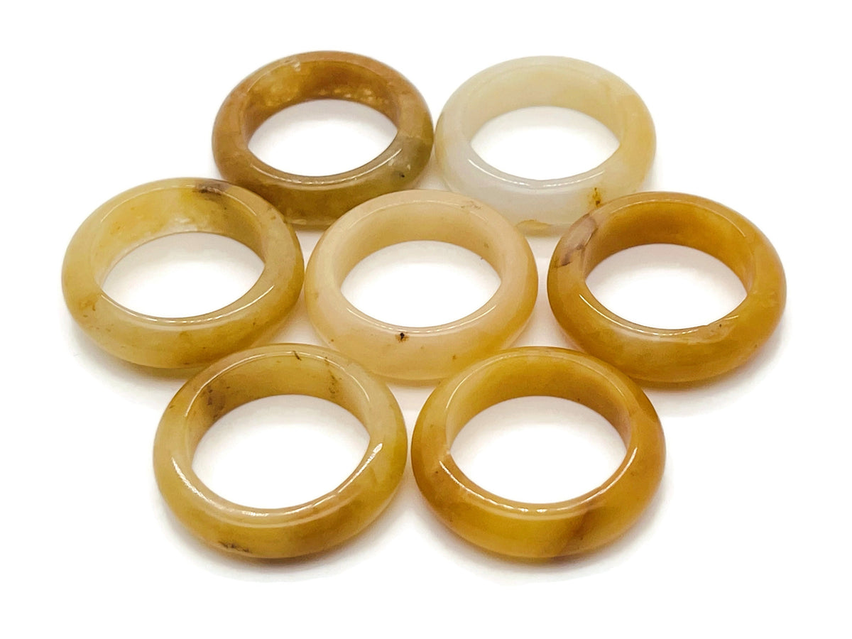 Yellow aventurine crystal ring by GemstoneGO featuring a polished yellow gemstone set in a silver band.