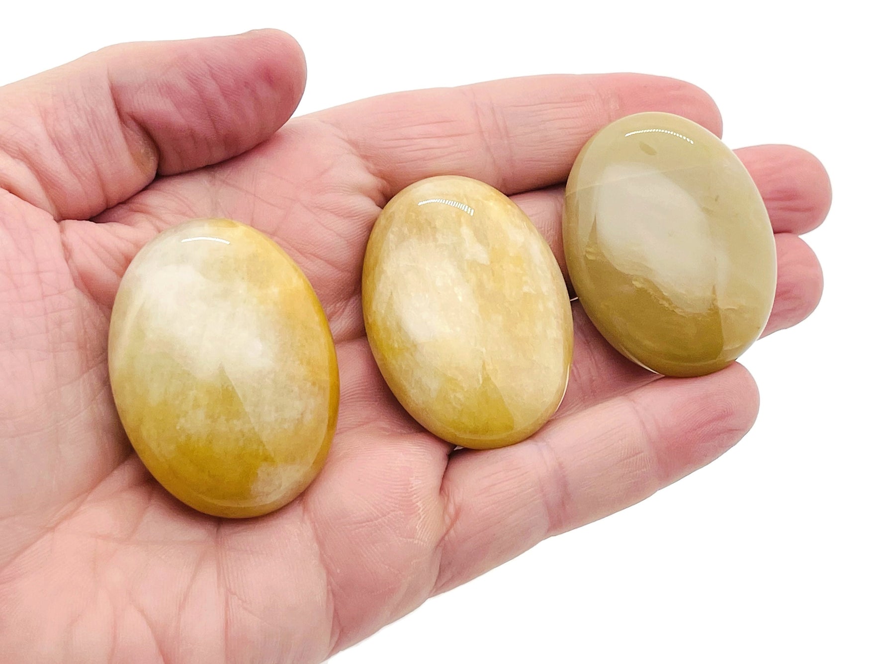 Yellow aventurine palm gemstone spa stone, 45x35mm, smooth polished yellow gemstone for relaxation and meditation.