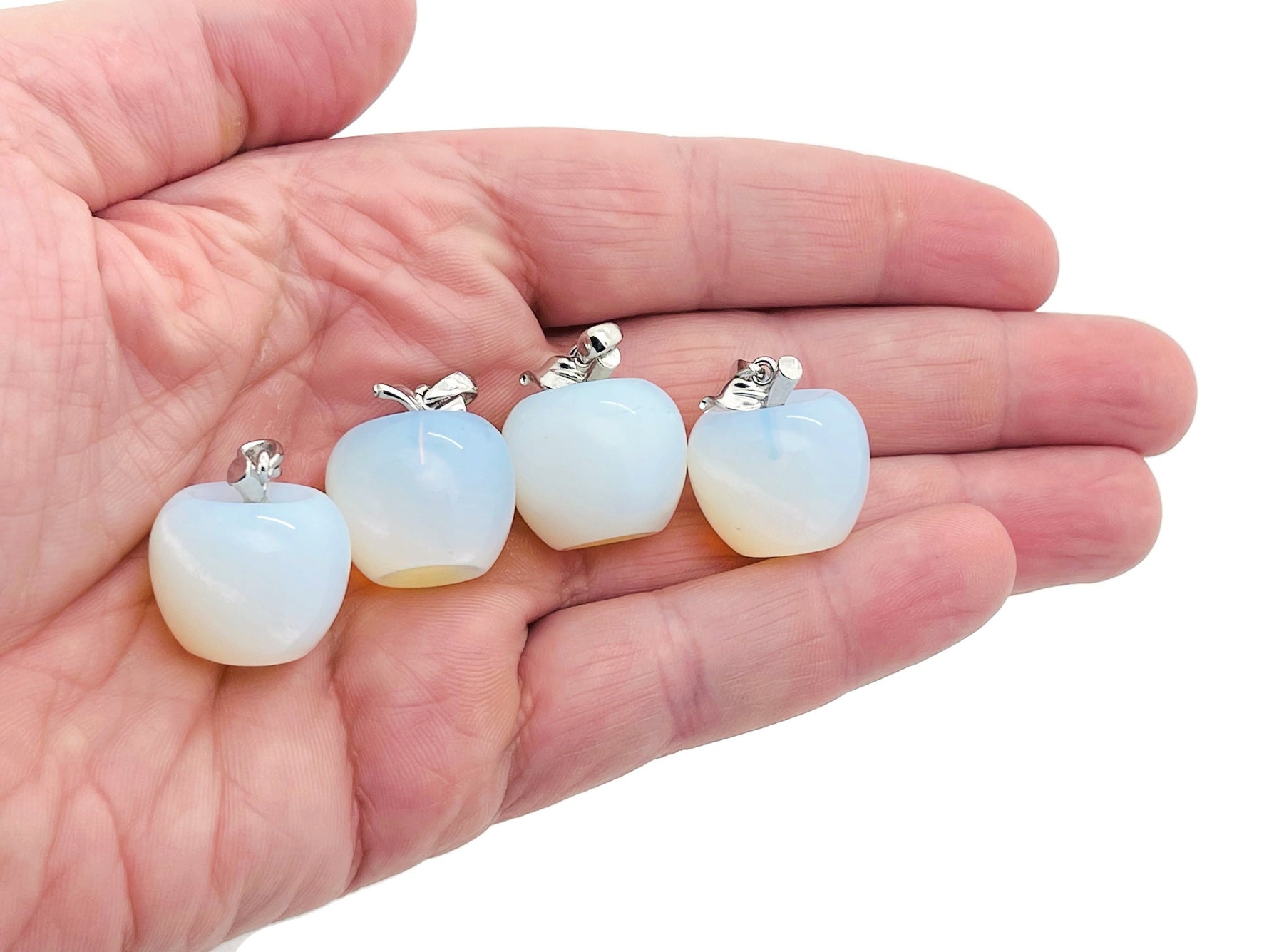 Opalite and apple-shaped crystal pendant from GemstoneGO, mini-sized gemstone jewelry with a smooth, polished finish.