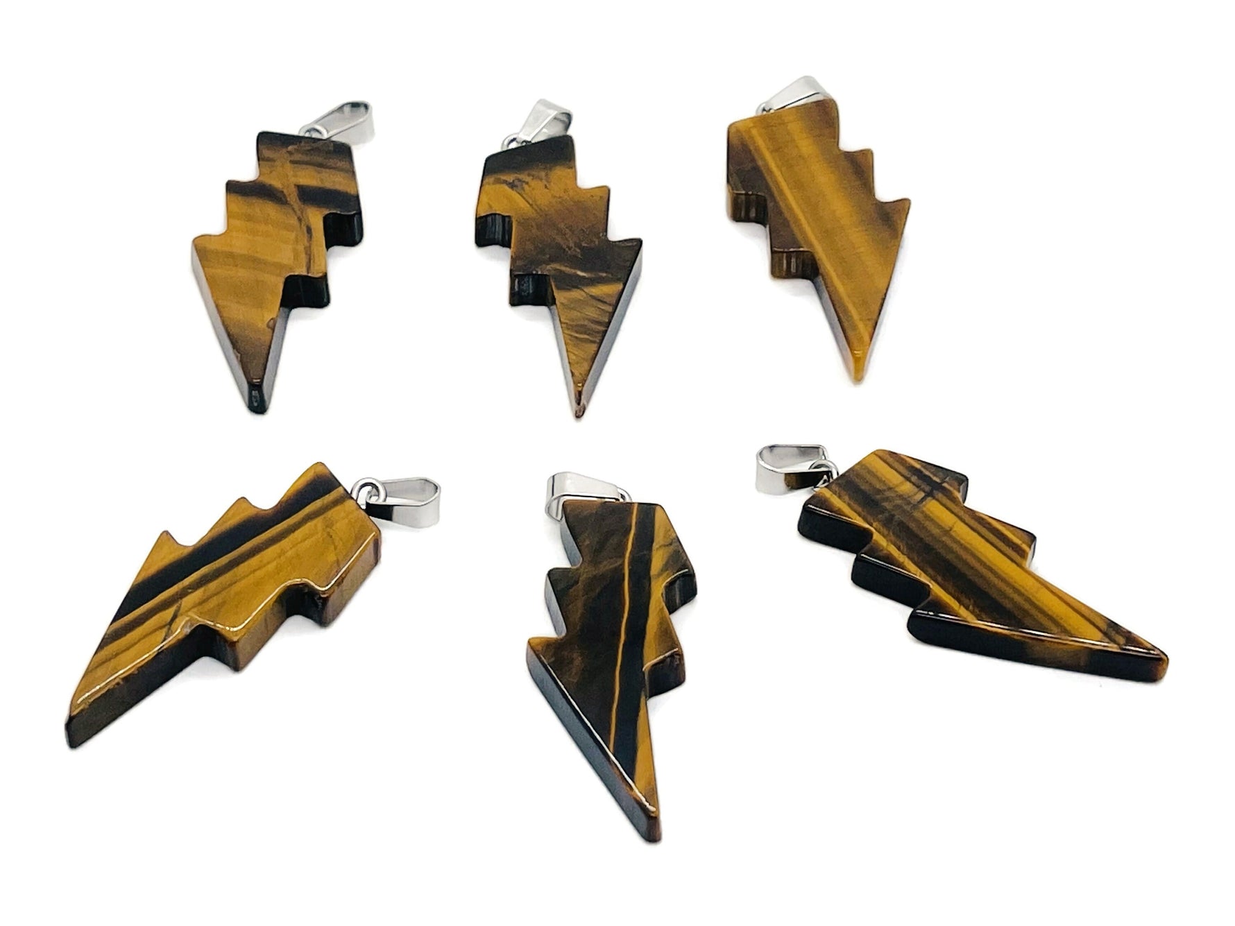 Tiger Eye Lightning Crystal pendant featuring a striking lightning stone design from GemstoneGO, showcasing a polished gemstone on a chain.