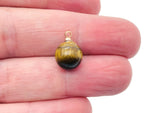 Tiger Eye ball beads crystal pendant from GemstoneGO featuring polished tiger eye stone jewelry component.