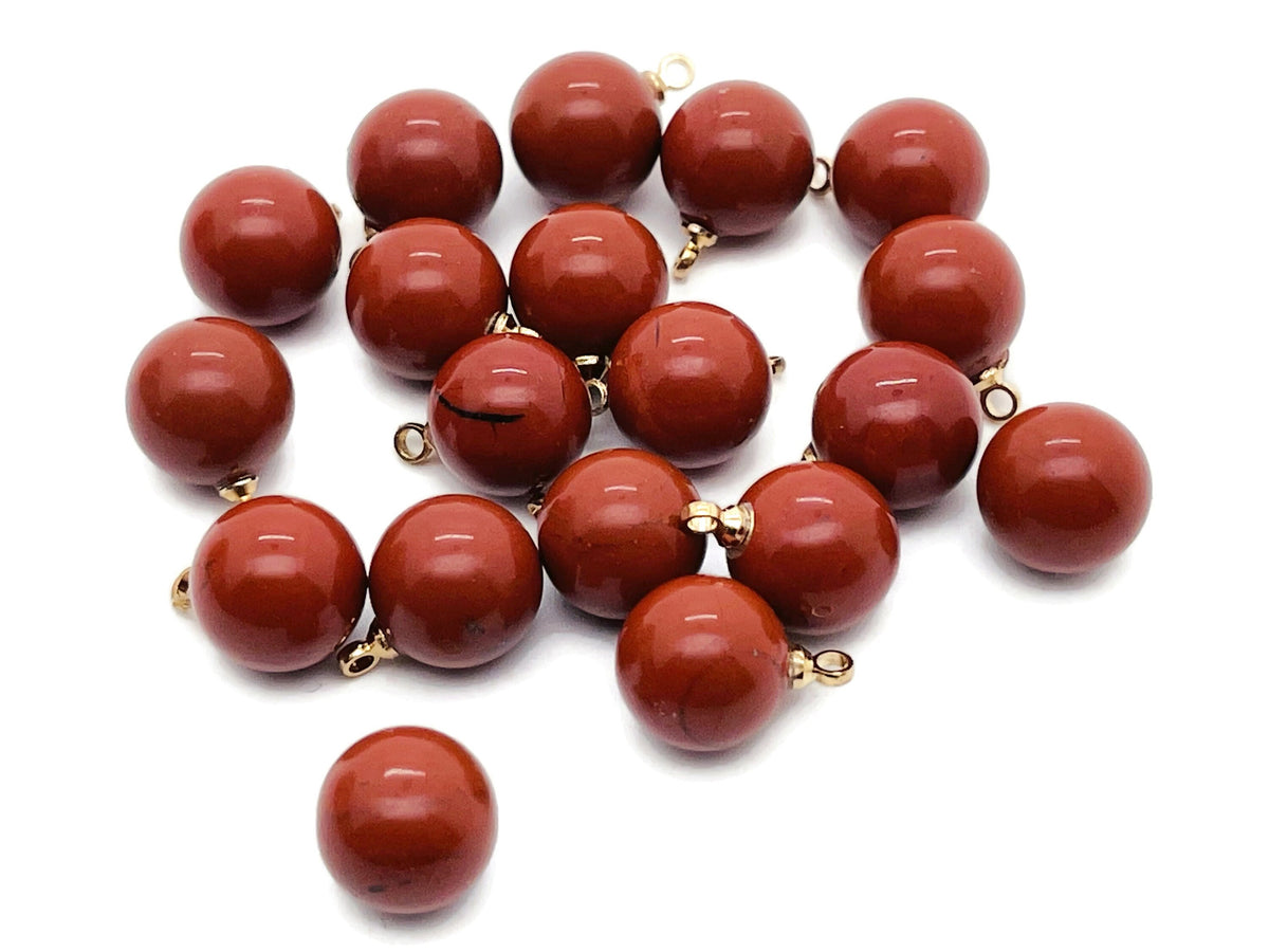 Red Jasper ball bead crystal pendant from GemstoneGO, showcasing a polished red jasper stone jewelry pendant.