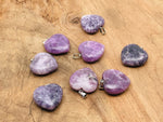 Lepidolite heart crystal pendant from GemstoneGO, showcasing a polished Reiki healing gemstone with a silver bail.