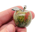 Unakite apple-shaped crystal carving by GemstoneGO, 30mm, featuring natural gemstone details and polished smooth surface.