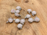 Rose Quartz crystal pendant jewelry by GemstoneGO, featuring a polished pink gemstone on a silver chain.