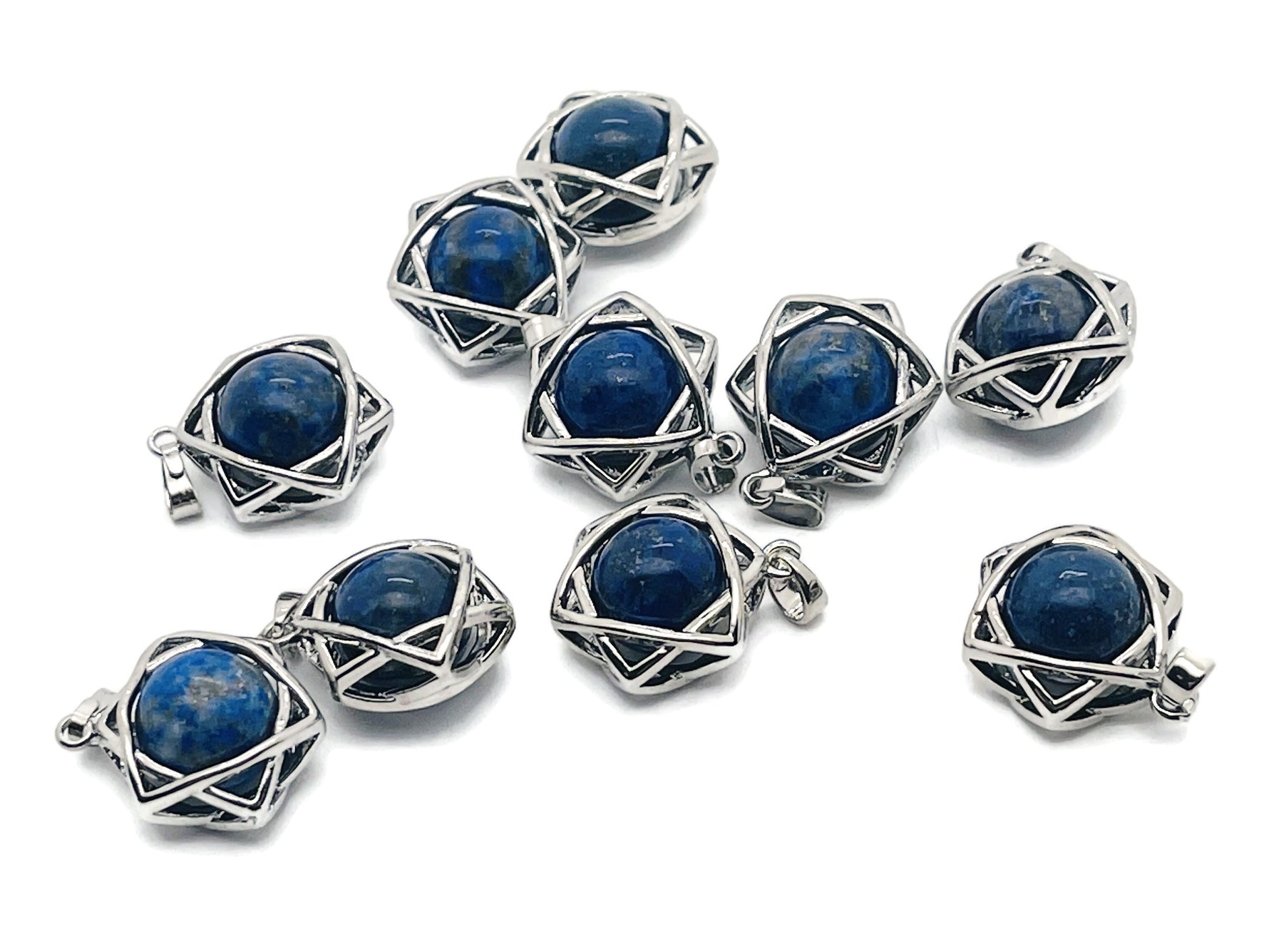 Lapis Lazuli crystal pendant jewelry by GemstoneGO featuring a deep blue gemstone with gold flecks on a silver chain.