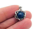 Lapis Lazuli crystal pendant jewelry featuring a deep blue gemstone with gold flecks on a silver chain.