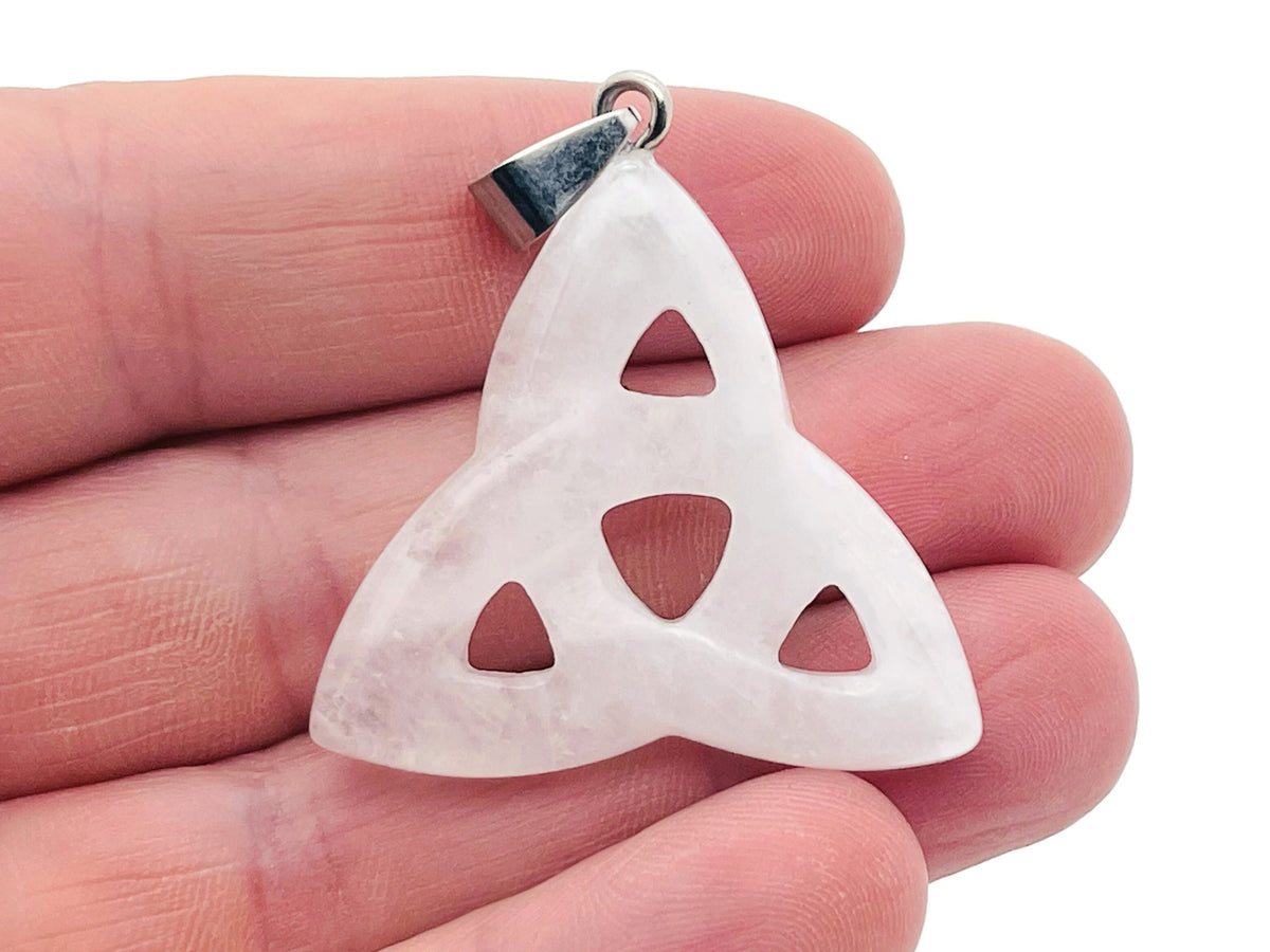 Clear Quartz Celtic Knot crystal pendant from GemstoneGO featuring a detailed Trinity Crystals design on a silver chain.