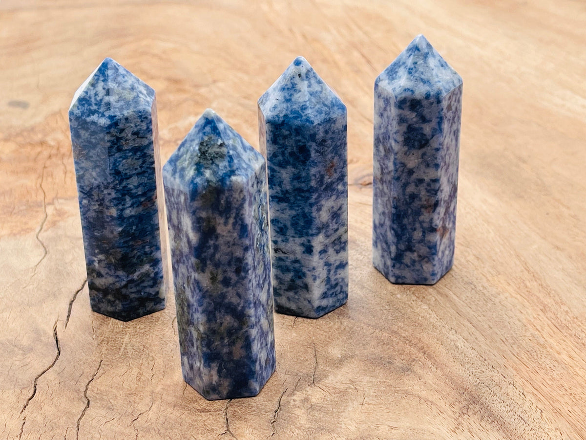 Blue Spot Jasper obelisk tower crystal with natural stone patterns, showcasing its vibrant blue and earthy mineral textures.