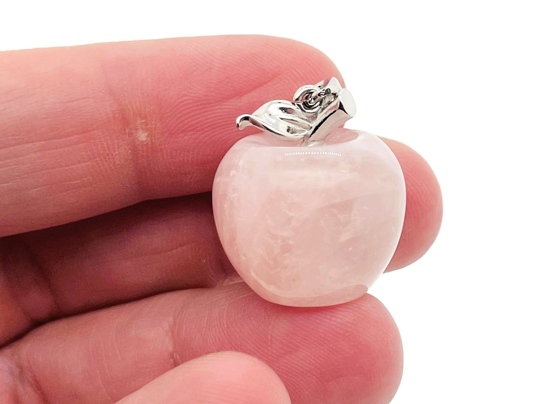 Rose quartz apple crystal pendant by GemstoneGO featuring a mini crystal design, displayed on a white background.