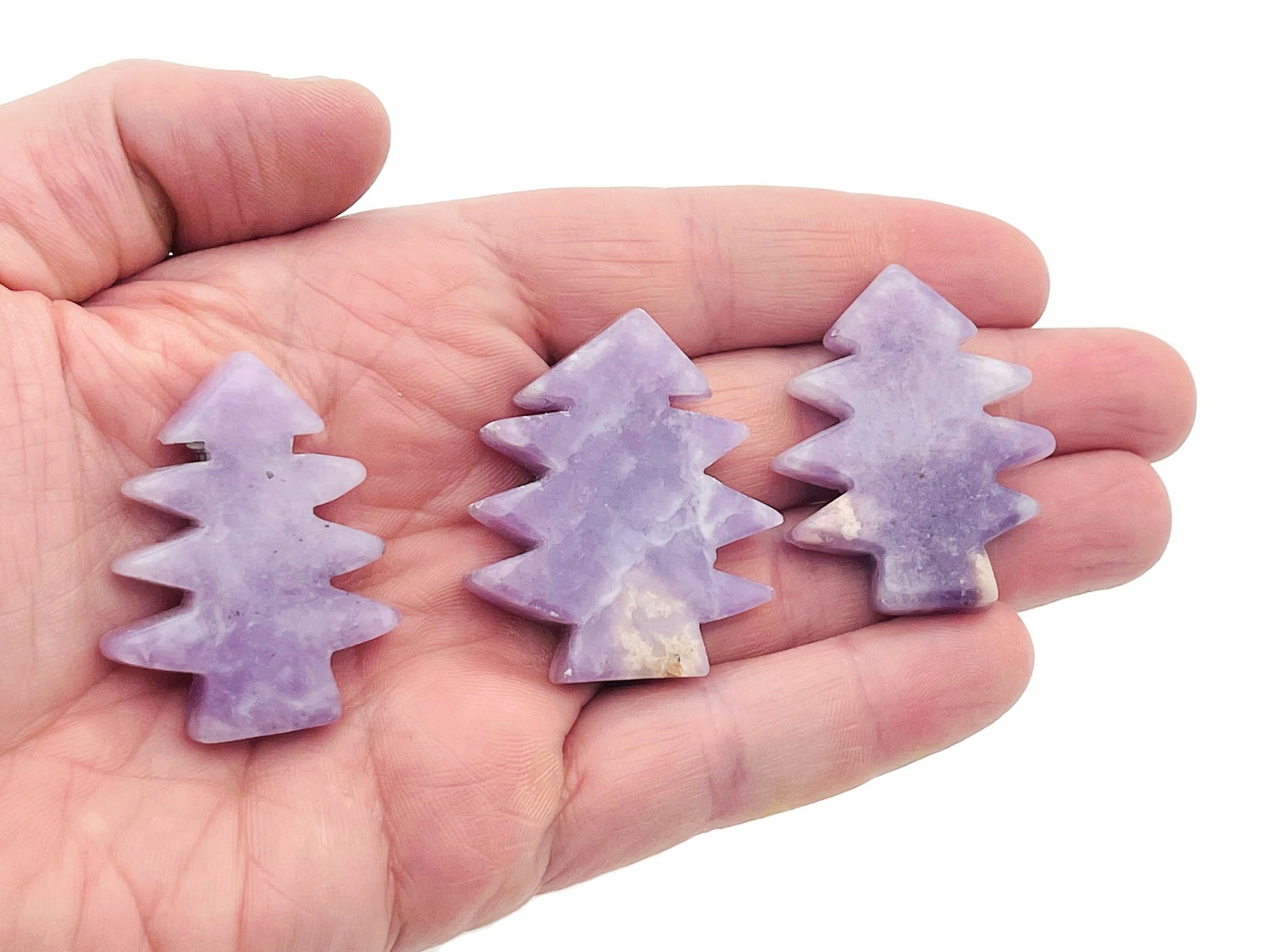 Handmade Lepidolite pine tree carving gemstone from GemstoneGO, showcasing detailed purple-green stone with natural tree design.