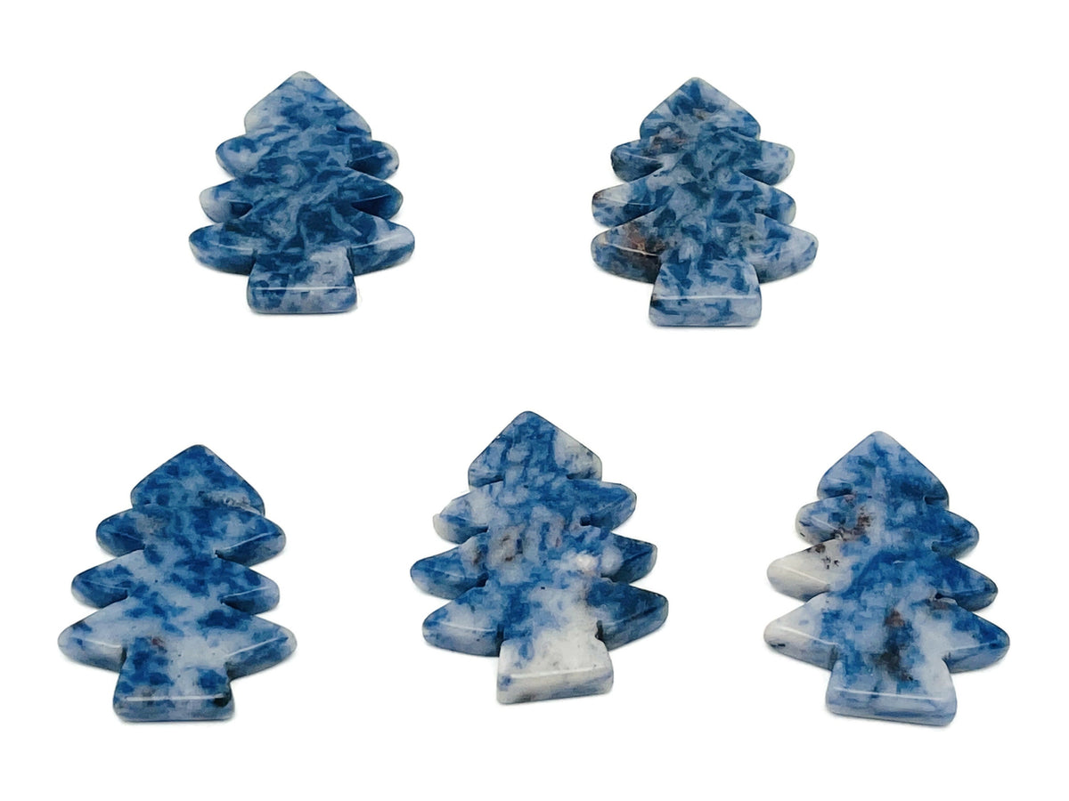 Handmade Blue Spot Jasper gemstone carving of a pine tree, showcasing detailed craftsmanship and natural stone patterns.