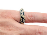 Dalmatian Jasper crystal ring by GemstoneGO featuring a distinctive spotted stone set in a silver band.