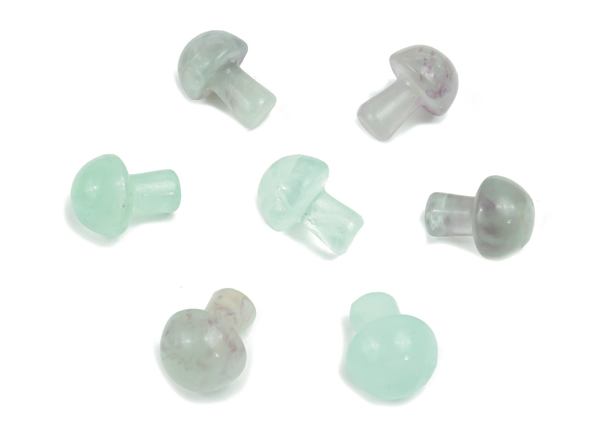20mm fluorite mushroom carved gemstone from GemstoneGO, showing vibrant purple and green hues with detailed mushroom carving.